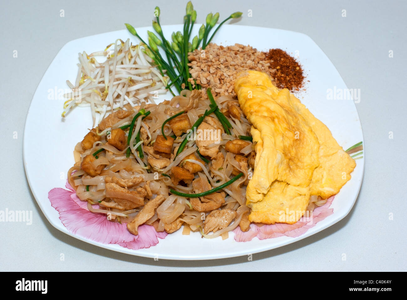 Chicken Pad Thai plate served in a beautiful dish Stock Photo