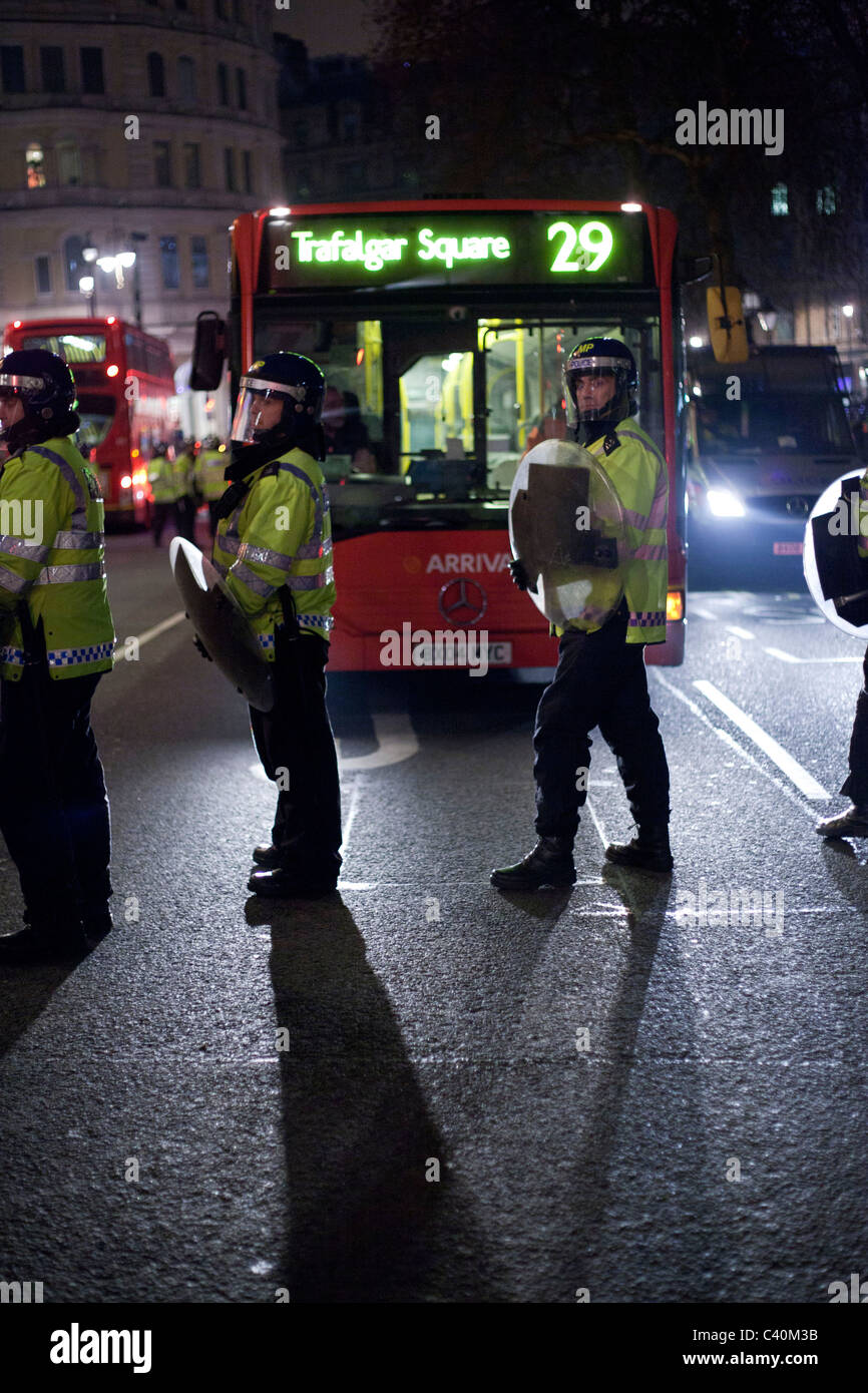 A police cordon blocks the way of the number 29 bus on the road around Trafalgar Sqaure. Stock Photo