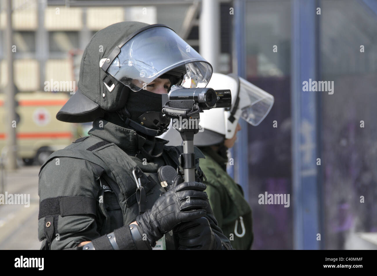 helmet, camera, cameraman, police, police officer, sheriff's department, police application, policeman, police officer, protests Stock Photo