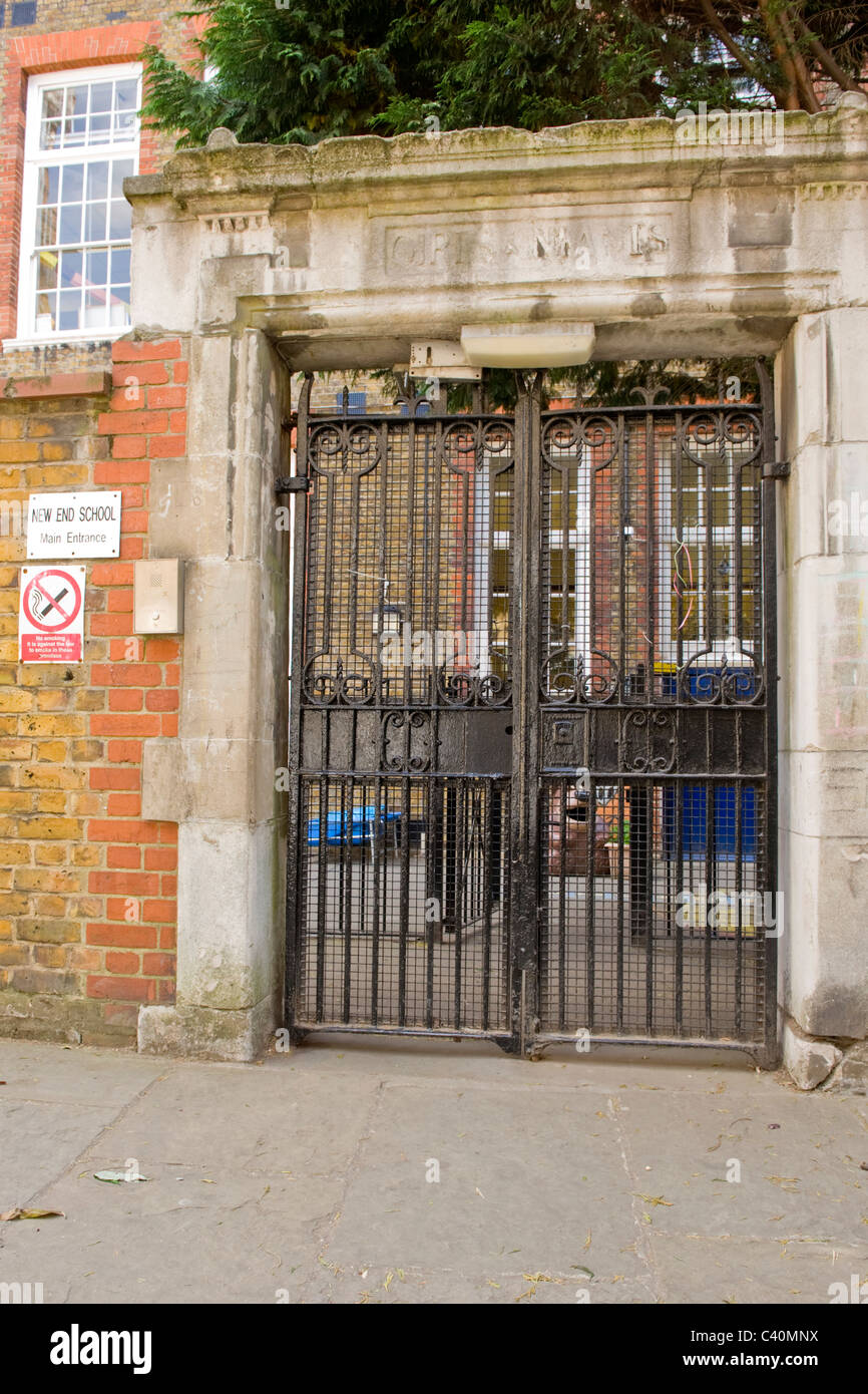 London , Hampstead Village , New End School gated main entrance , erstwhile girls infants gate , no smoking sign for children ? Stock Photo