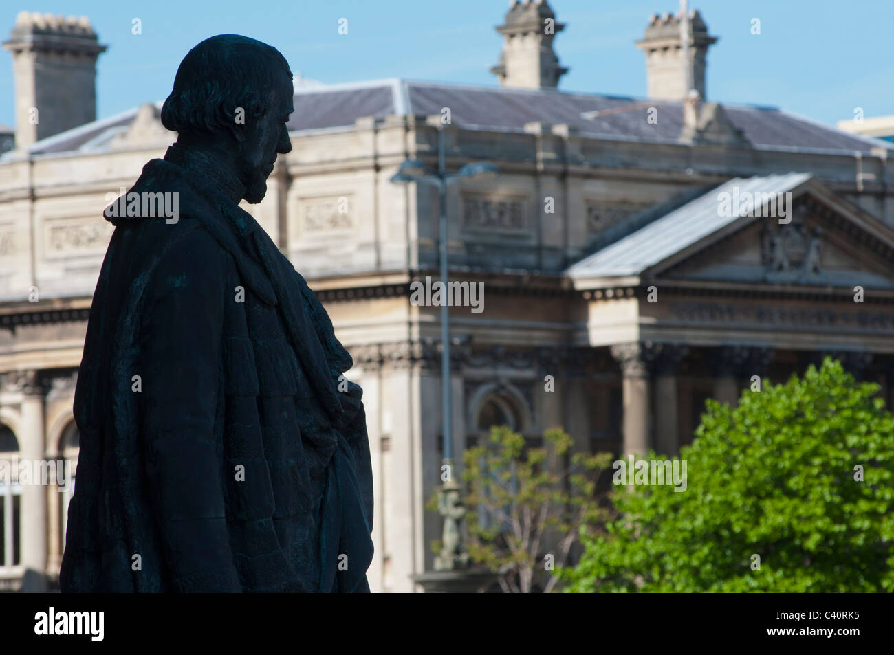 A statue of Disraeli, Earl of Beaconsfield at George's hall, looks towards the Walker Art Gallery, Liverpool, England. Stock Photo