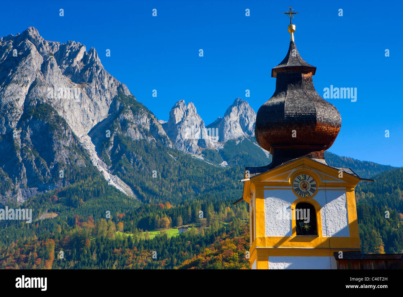Werfen, Austria, Europe, Salzburg, village, church, steeple, mountains, wood, forest, autumn Stock Photo