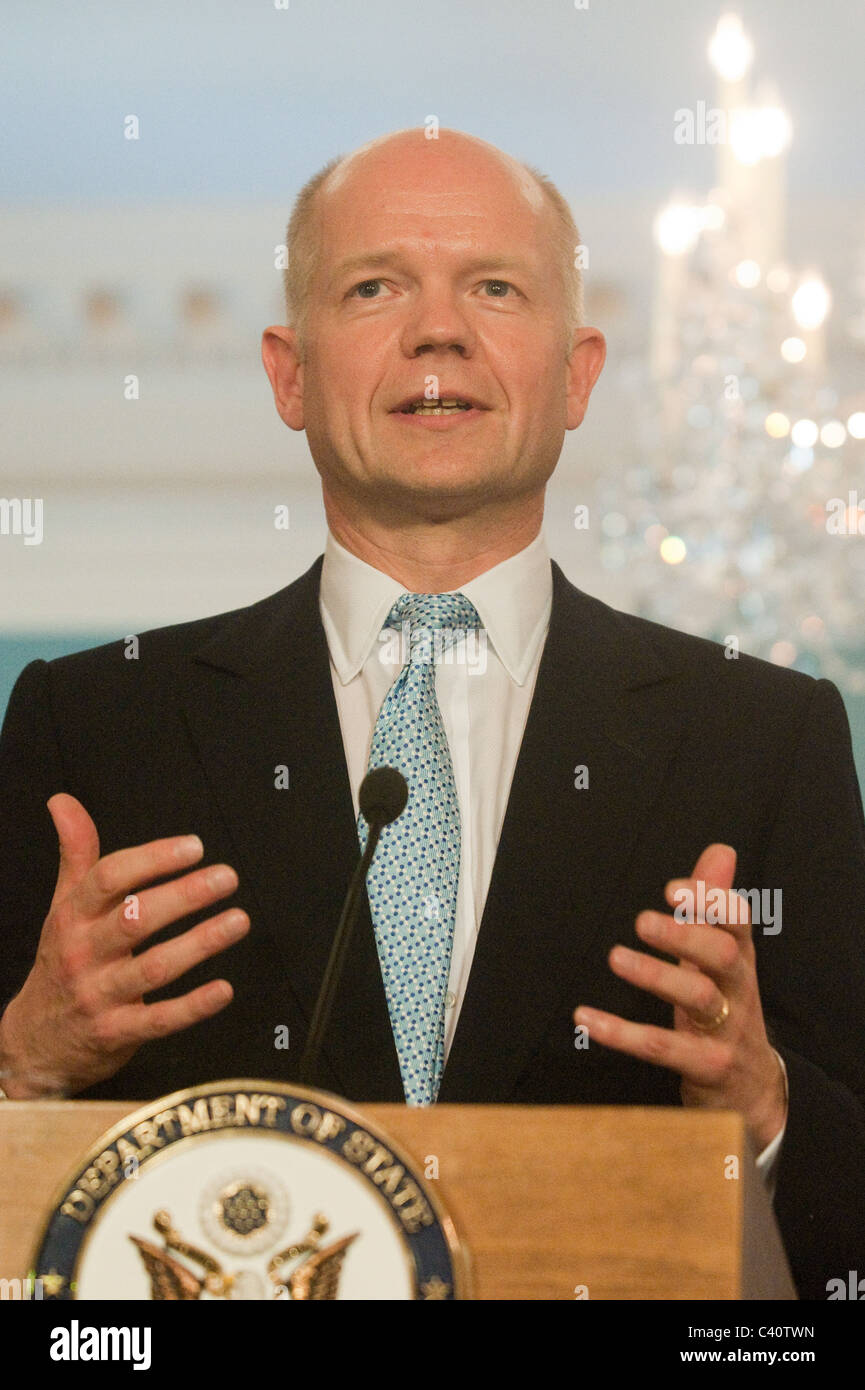 U.S. Secretary of State Hillary Clinton meets with a British Foreign Minister William Hague before a bilateral meeting , at the Stock Photo