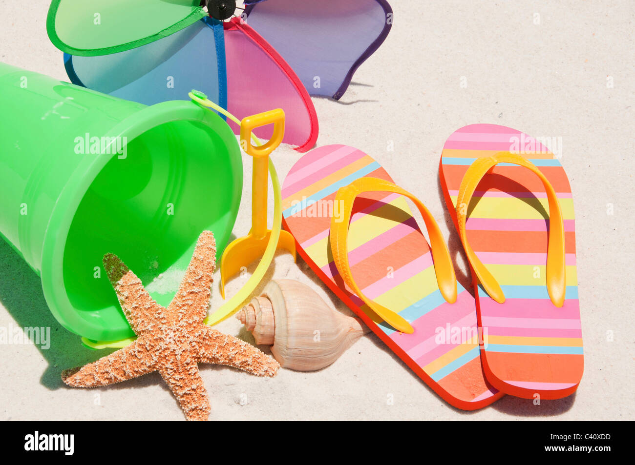 flip flops on beach sand Stock Photo - Alamy