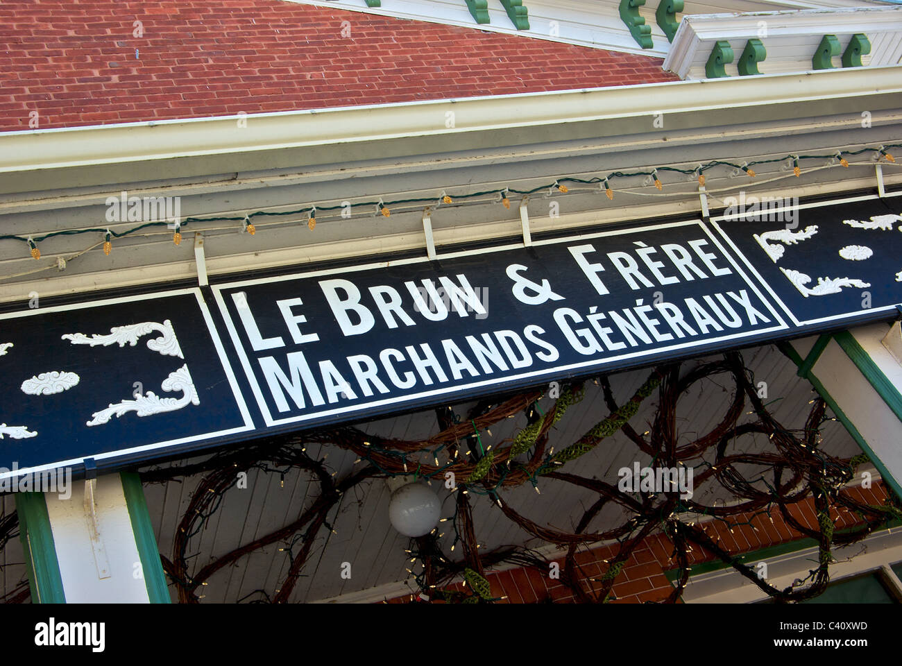 Store sign Magasin General Le Brun et Freres general store museum