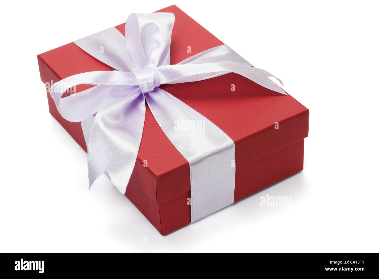 Red gift box with bow ribbon on white background Stock Photo - Alamy