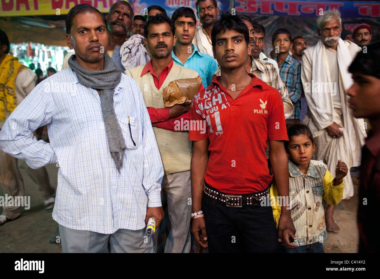Men watch rehearsal of the dancing show from the street,Sonepur Mela in Sonepur  in Bihar state, India. Stock Photo