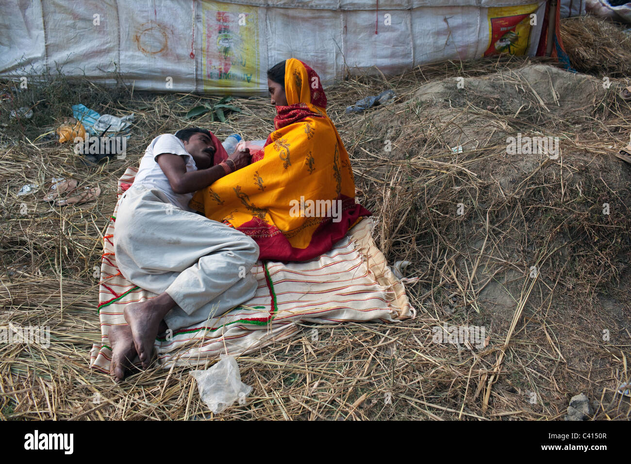 A young Indian couple in a tender pose at Sonepur Mela in Sonepur in Bihar state, India. Stock Photo