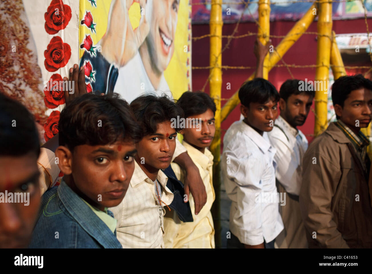 Young men queue up for a show featuring young dancing women at Sonepur Mela in Sonepur near Patna and Hajipur in Bihar state. Stock Photo