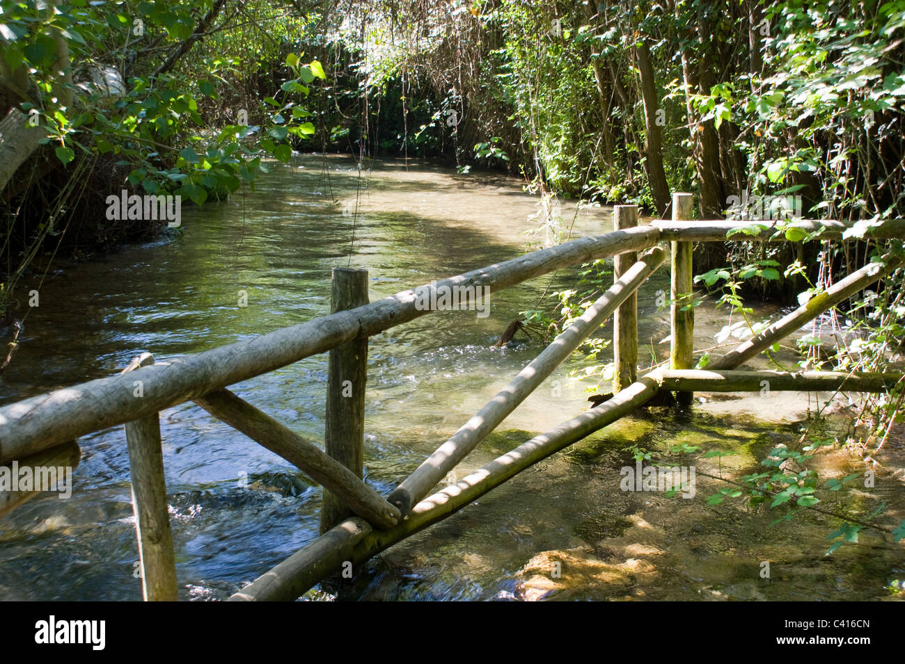 THE CLEAR WATERS OF THE RIO FRIO MEANDERING THEIR WAY DOWNSTREAM PAST ...