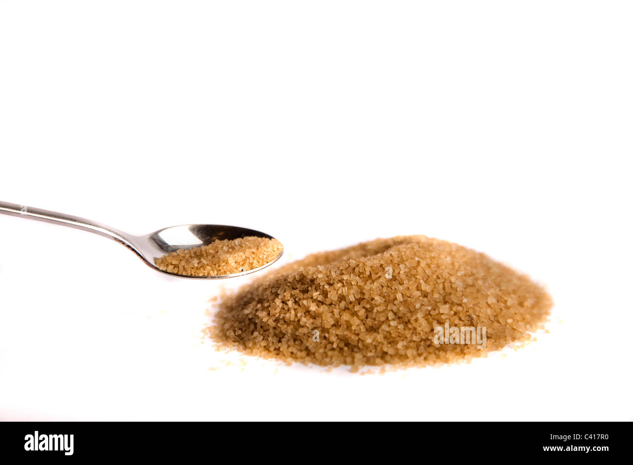 brown sugar with teaspoon Stock Photo