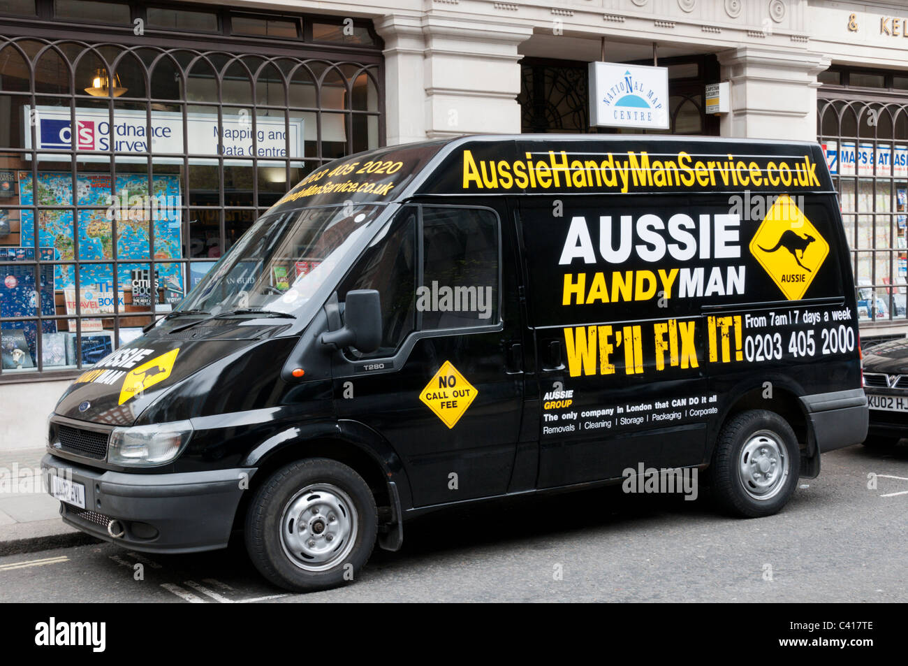 An Aussie Handyman black T280 Ford Transit van in Central London. Stock Photo