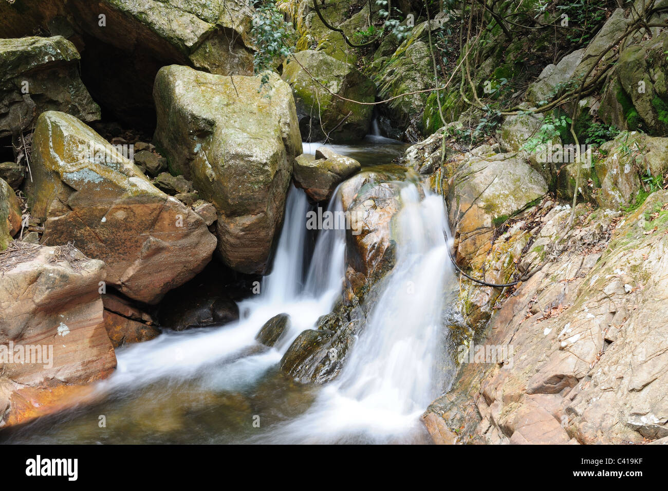 Flowing waterfall in China mountain areas Stock Photo