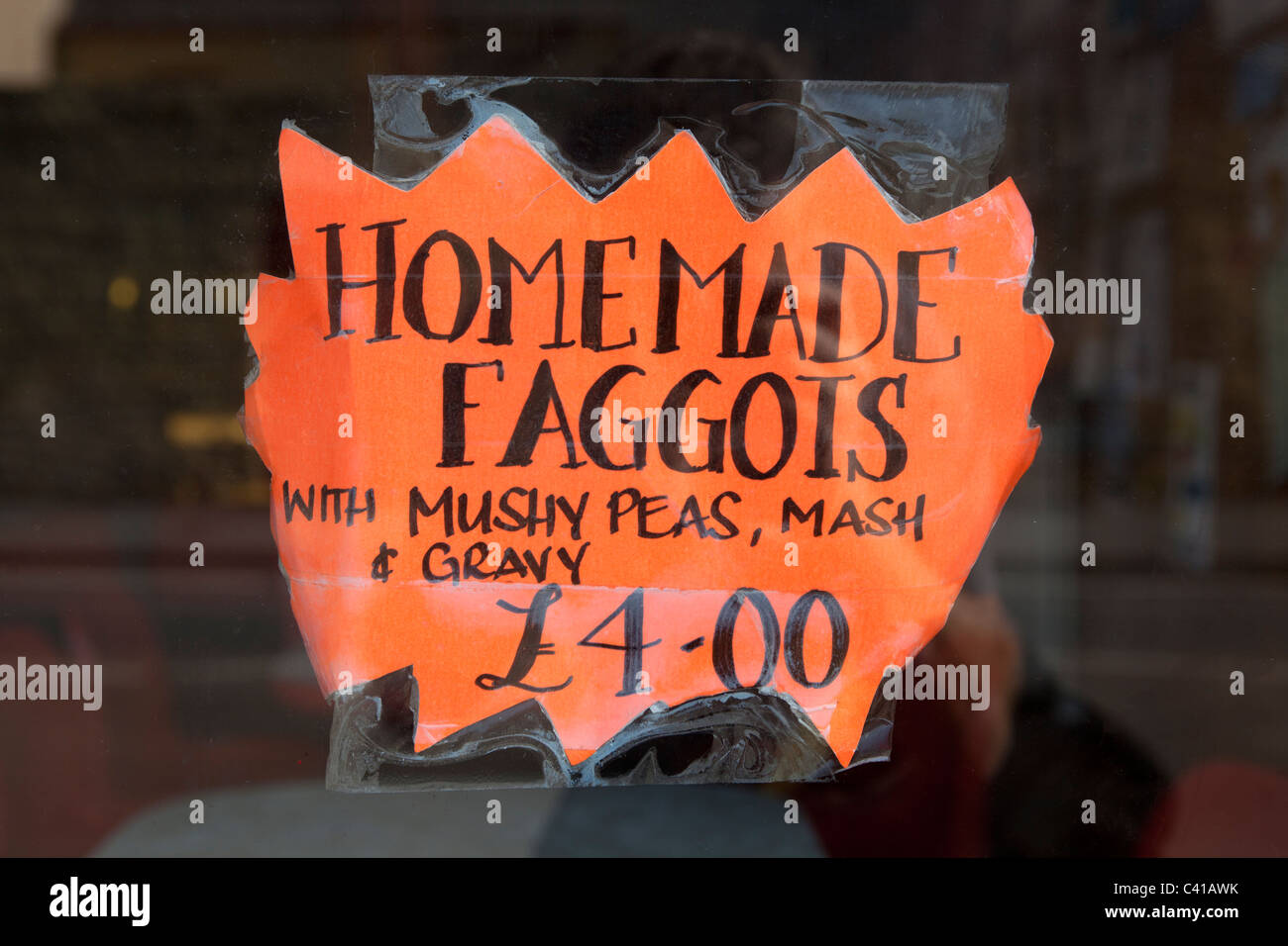 Home made faggots sign in cafe shop window Stock Photo