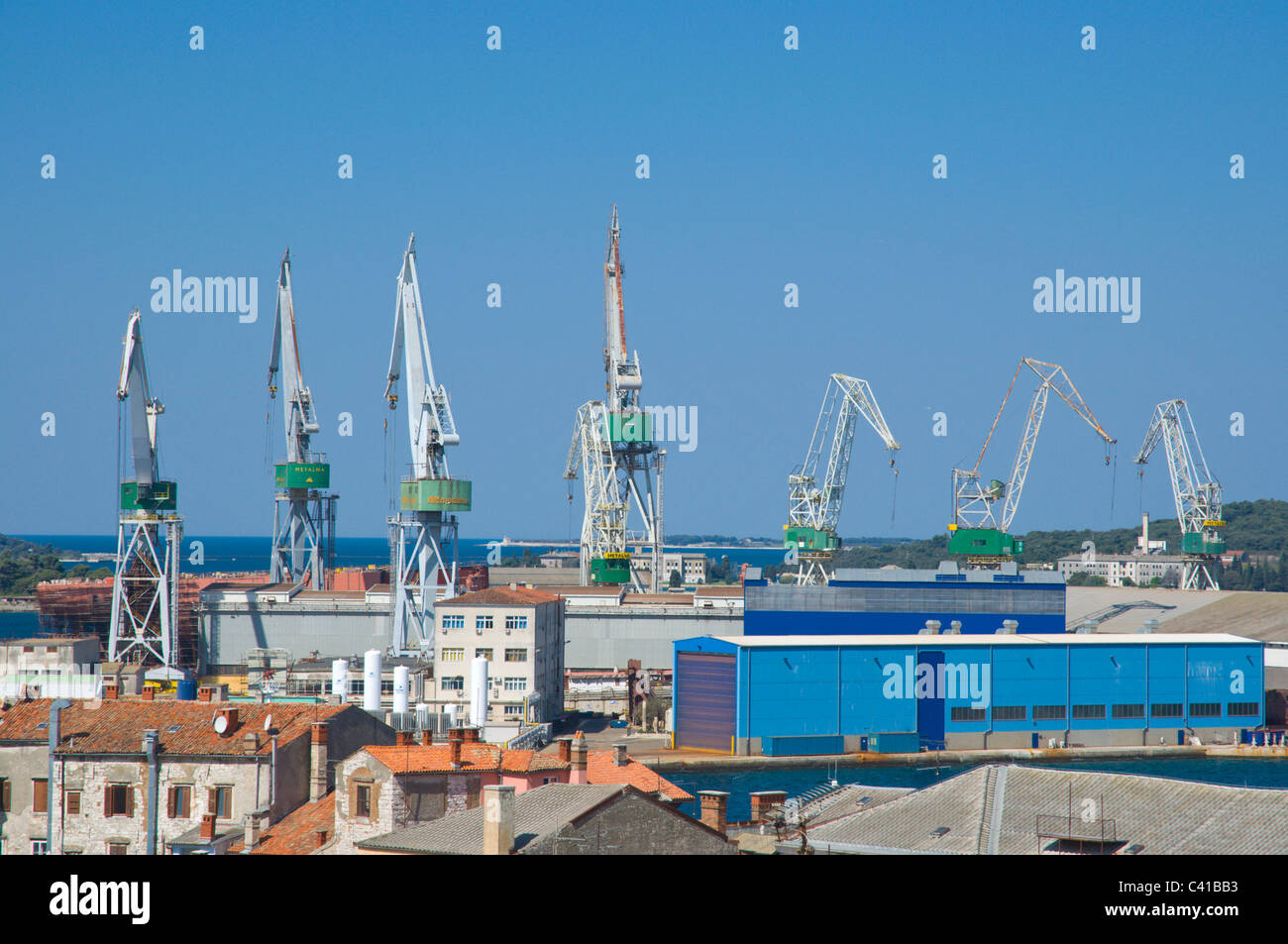 Cranes at the port of Pula the Istrian peninsula Croatia Europe Stock Photo