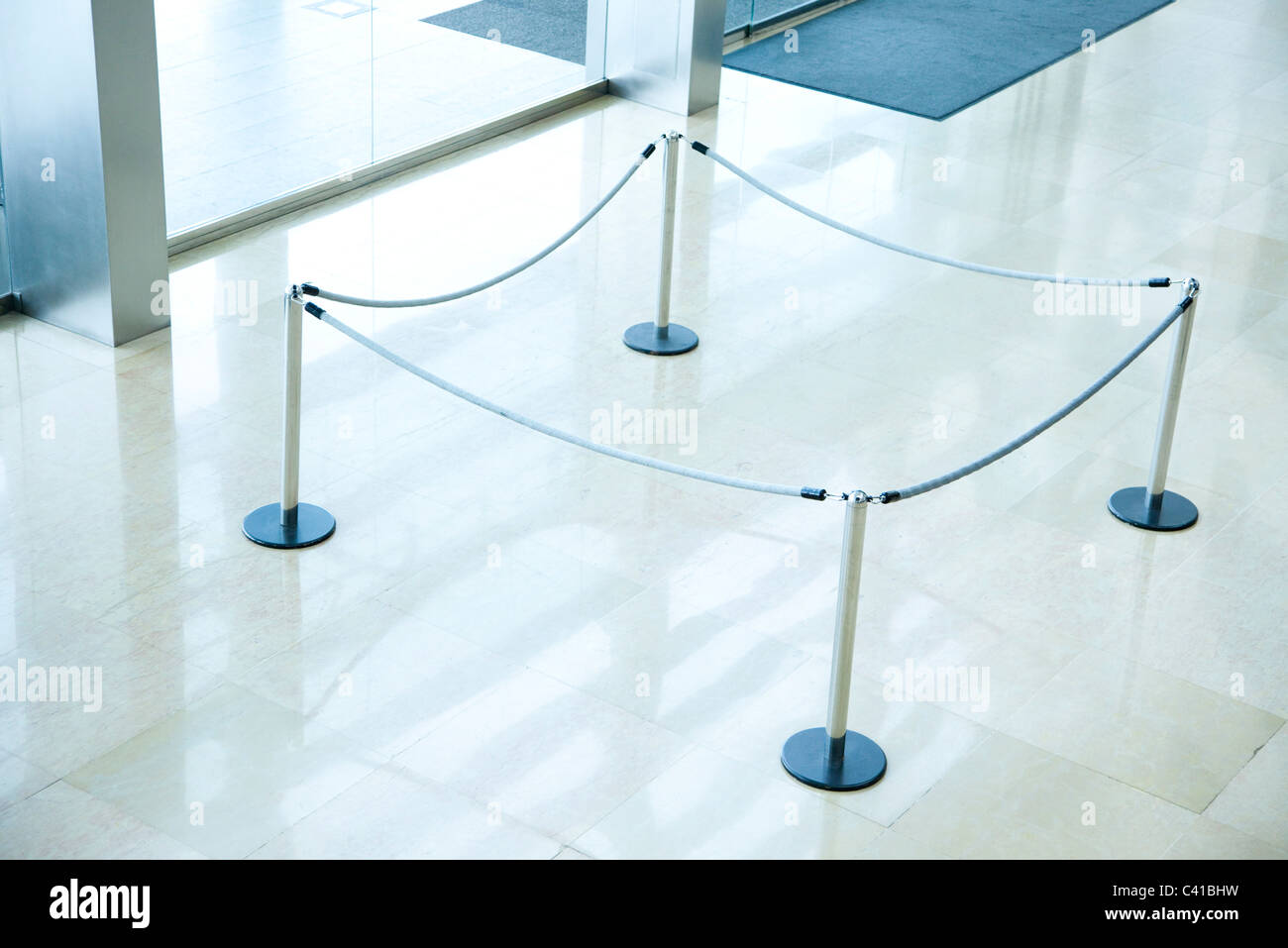Roped off area in lobby Stock Photo Alamy