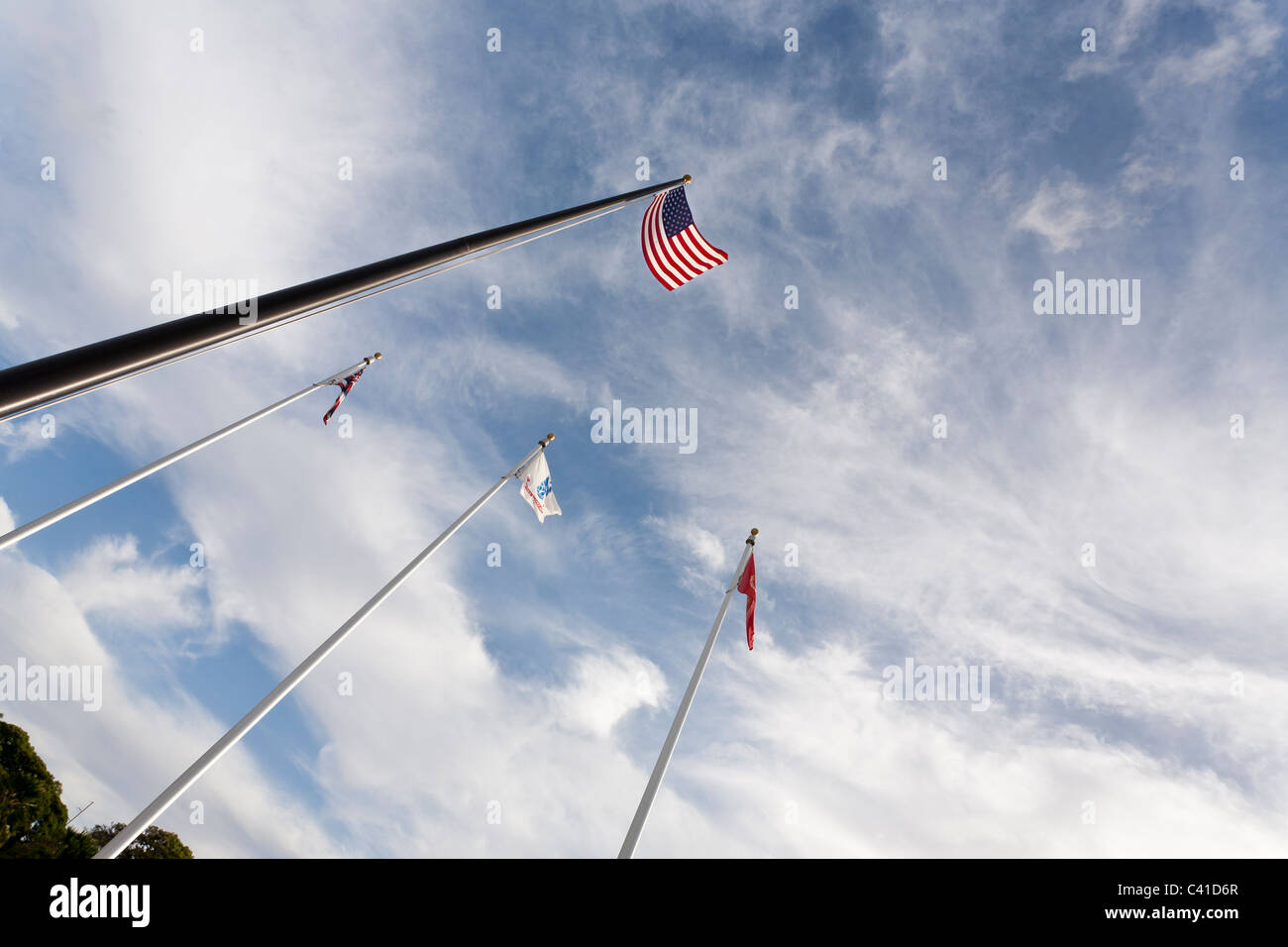 Perl Harbor flag poles. US Flag and flags of the Navy, Army and Marine