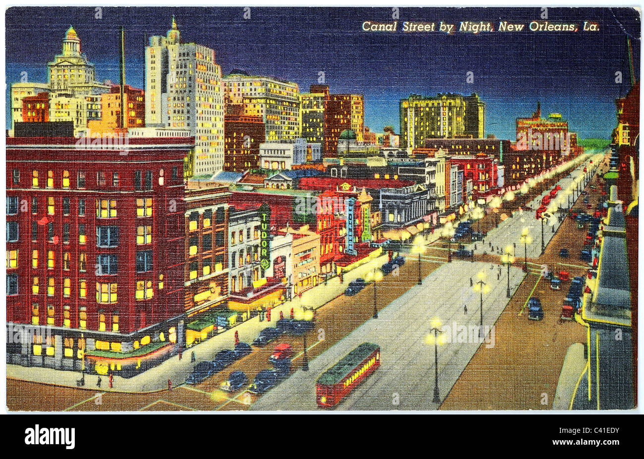 Canal Street at Night in New Orleans, Louisiana, from a vintage linen post card Stock Photo