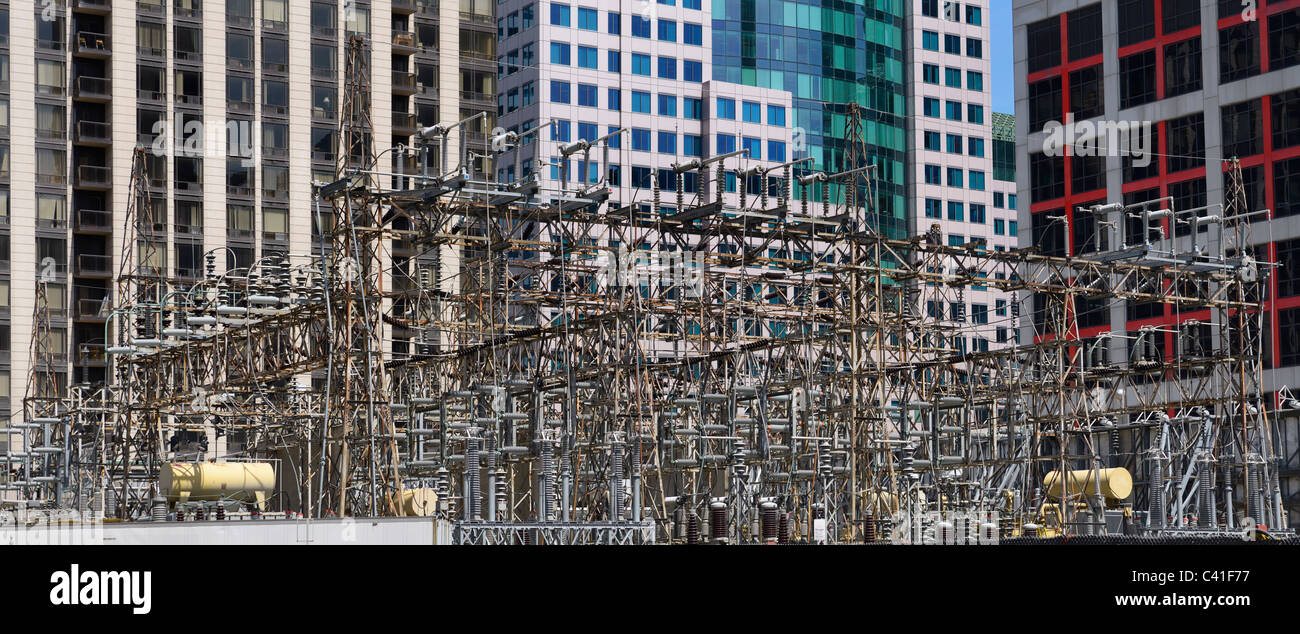 Panorama of electrical substation surrounded by high rise office building towers in downtown Toronto Stock Photo