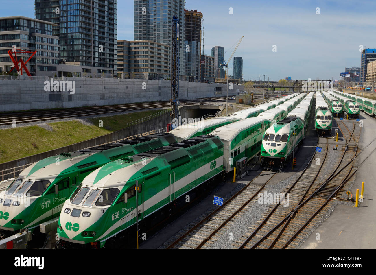 GO Train commuter railroad cars lined up on downtown Toronto tracks