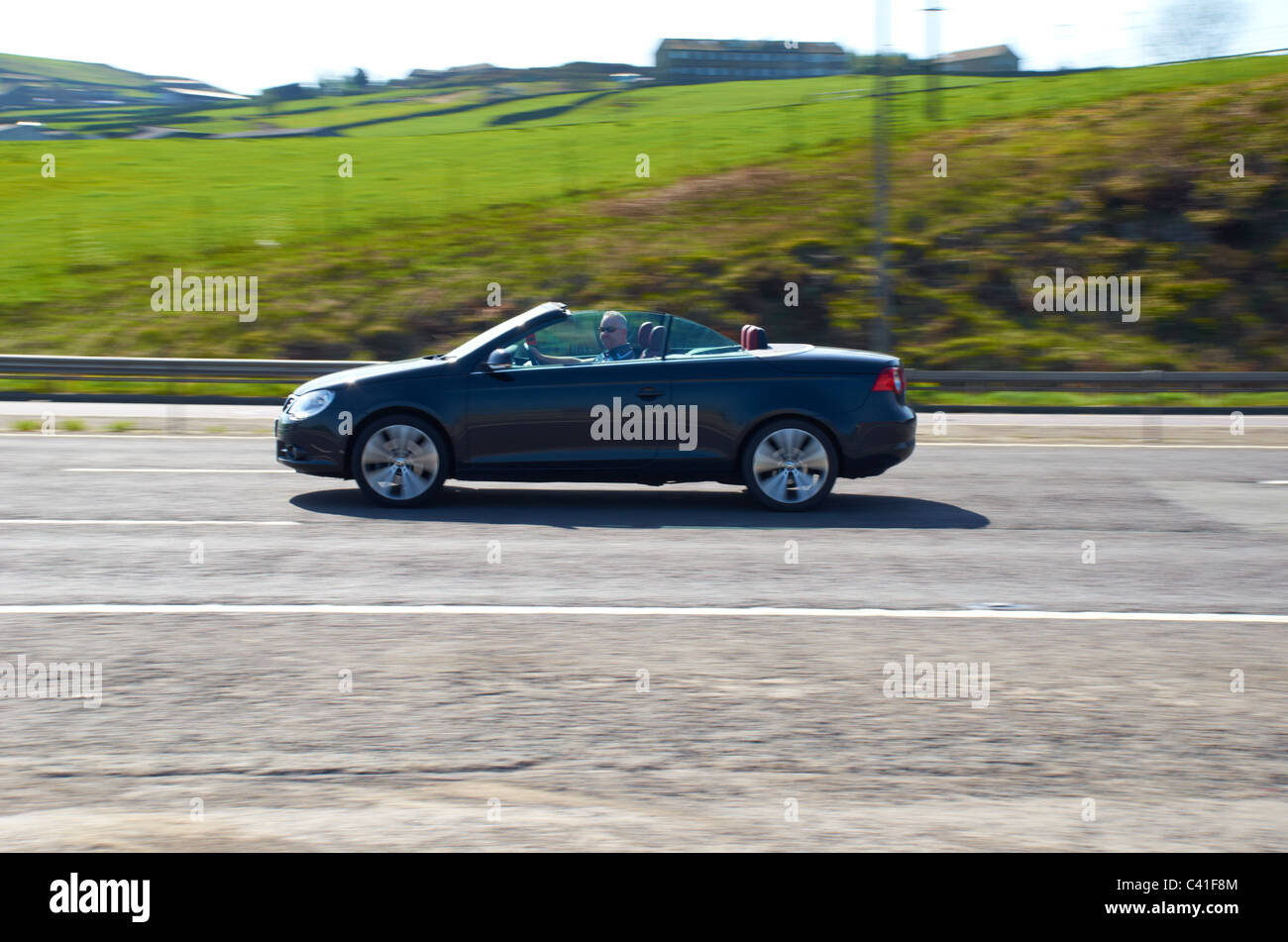Open top car on the motorway Stock Photo Alamy