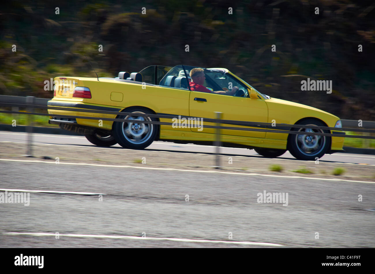 BMW open top sports car on the motorway Stock Photo - Alamy