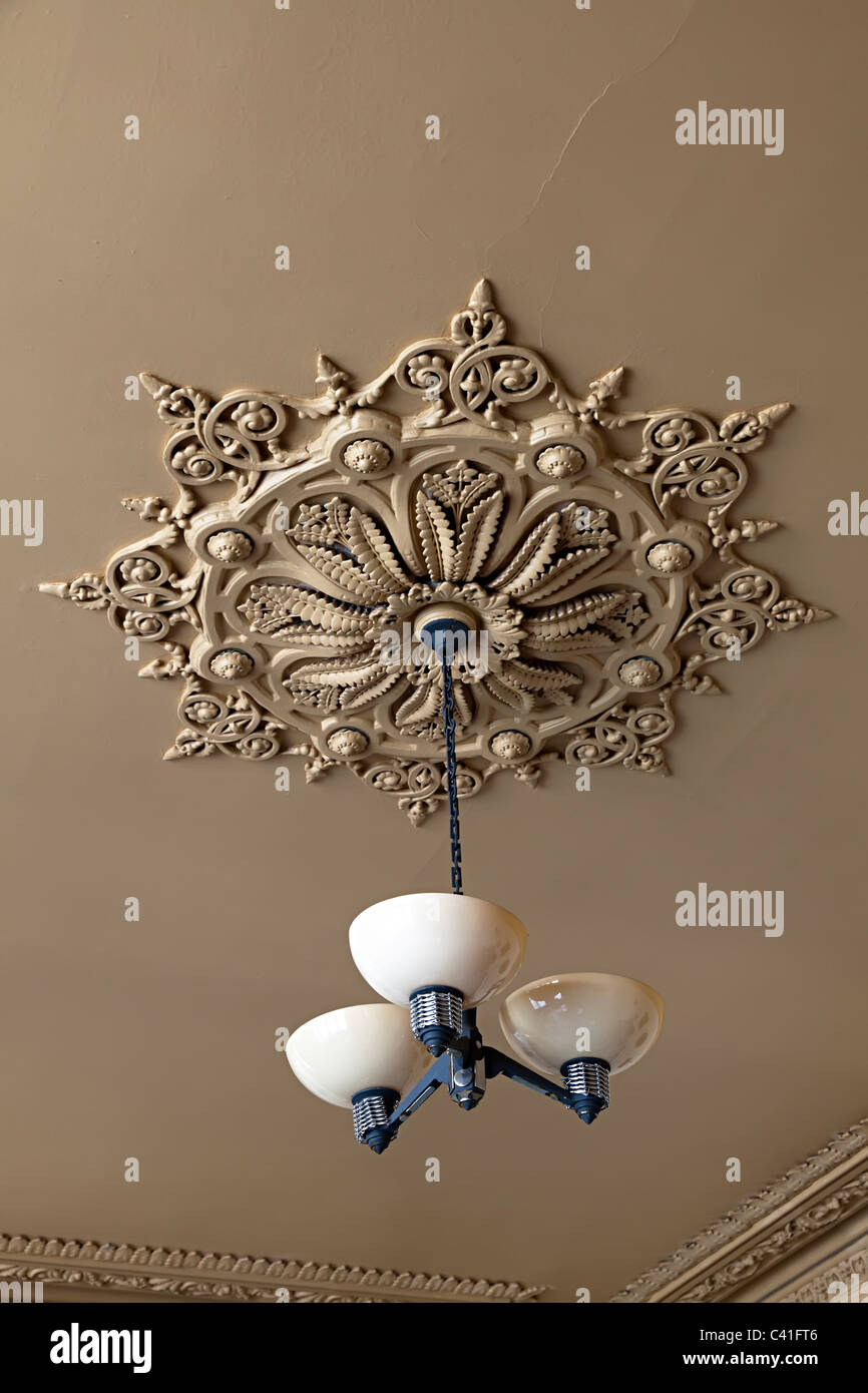 Ceiling rose decoration in Victorian house Cardiff Wales UK Stock Photo