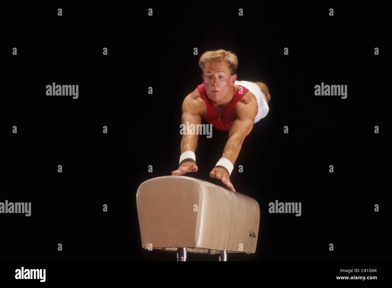 Male gymnast on the vault Stock Photo Alamy