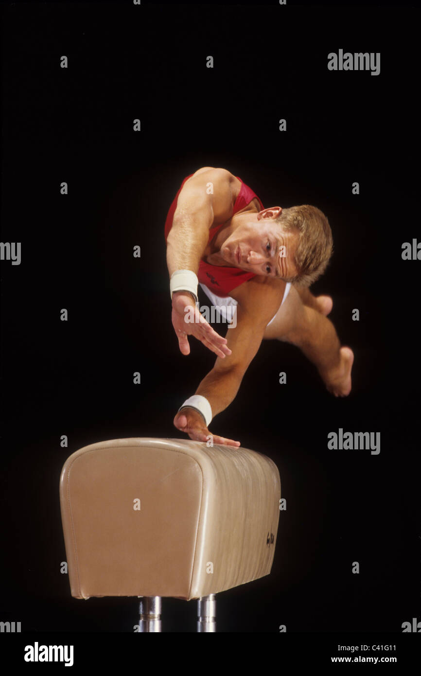 Male gymnast on the vault Stock Photo Alamy