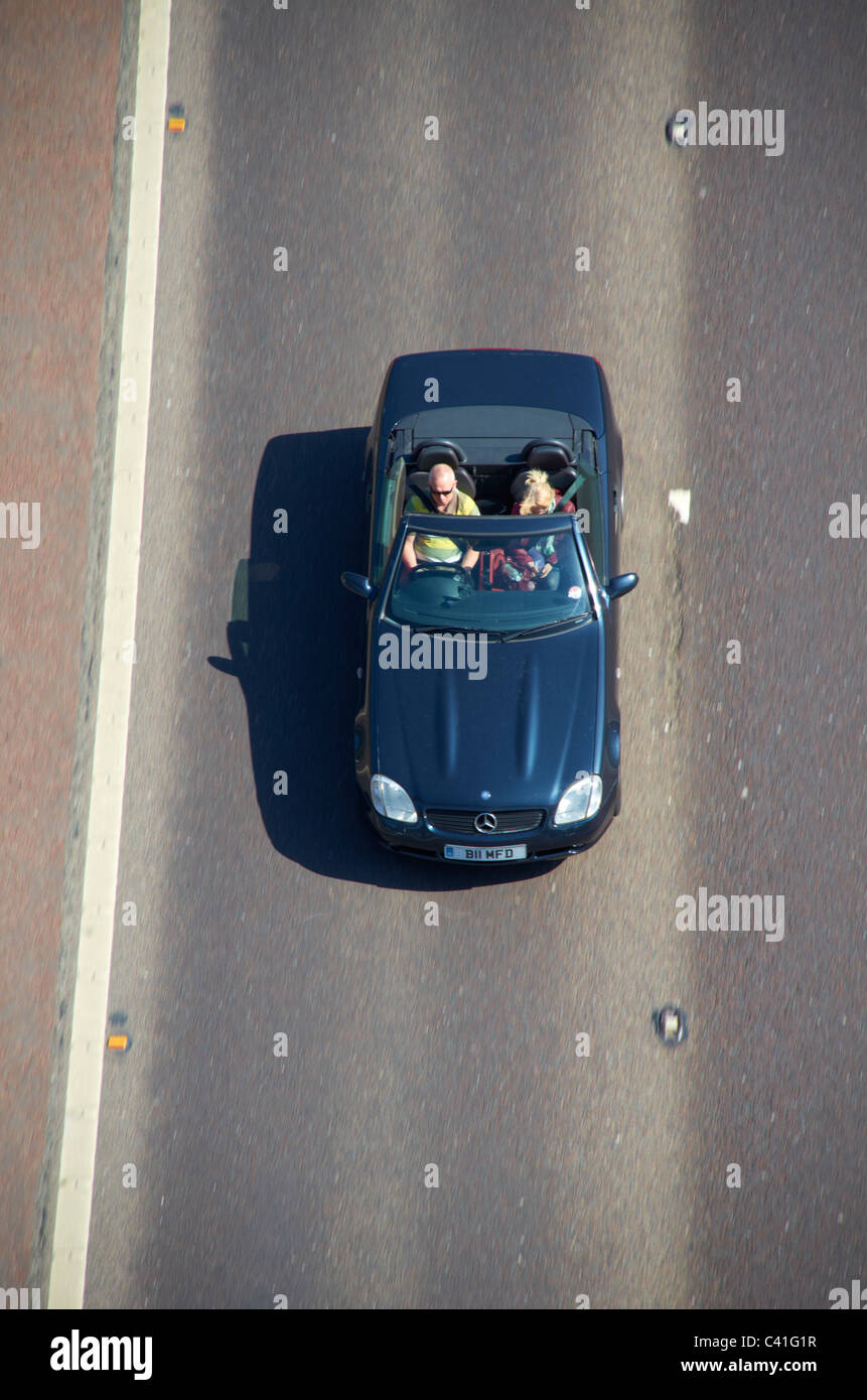 Mercedes open top car on the M62 motorway. Stock Photo