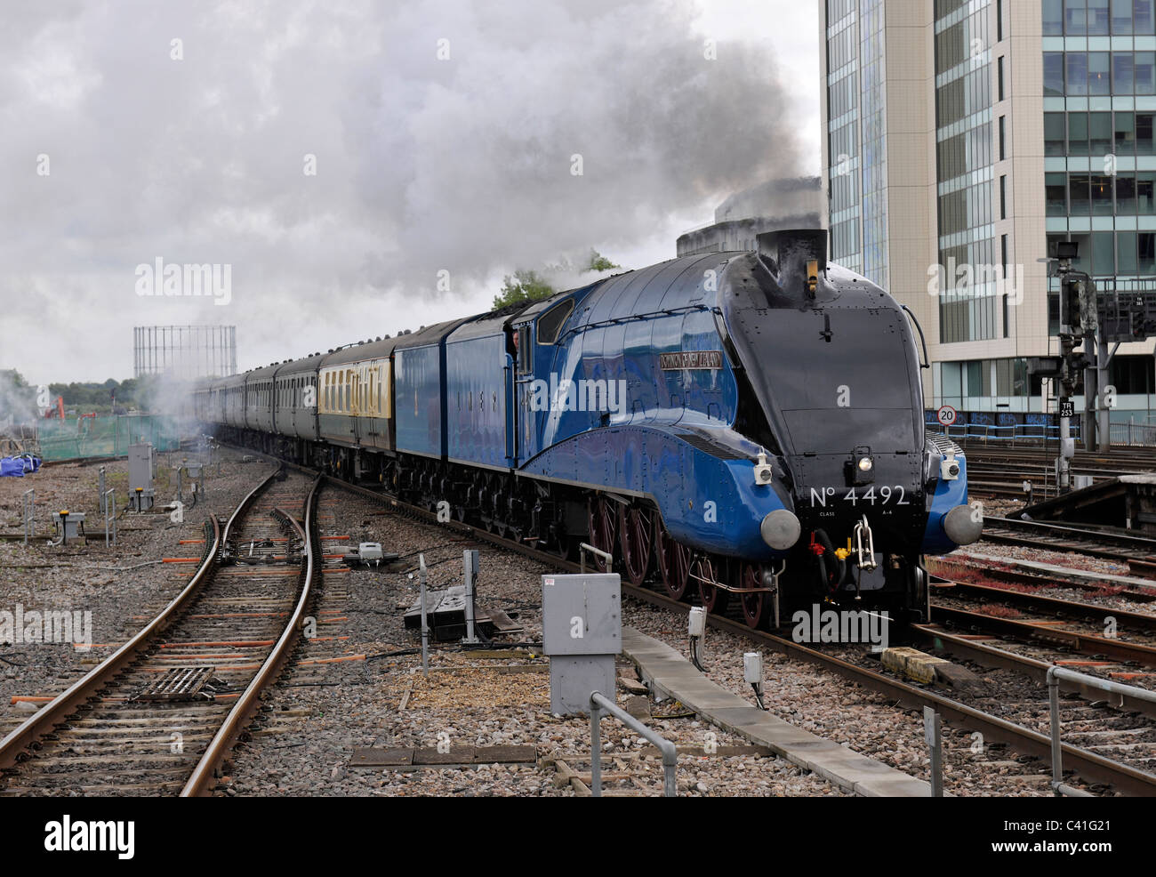A4 Pacific Dominion of New Zealand passing Reading Station with The Cathedrals Express Train UK Stock Photo
