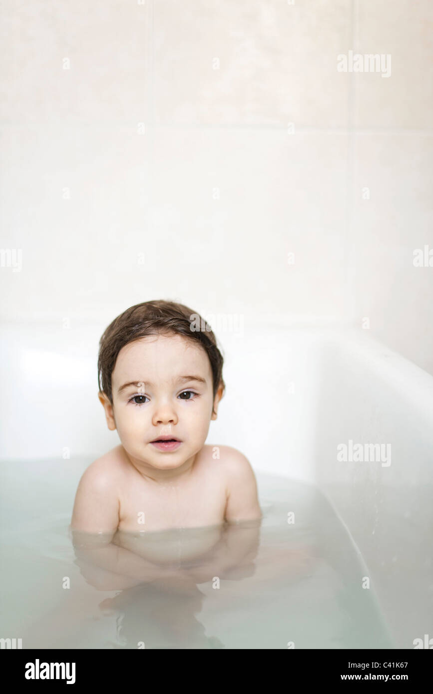 Toddler boy taking a bath, portrait Stock Photo Alamy