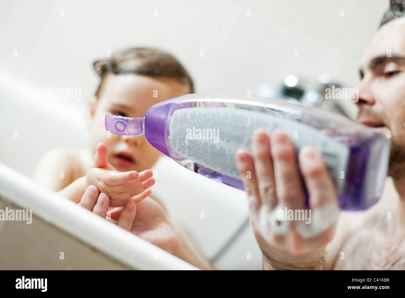 Father and toddler son bathing together Stock Photo Alamy