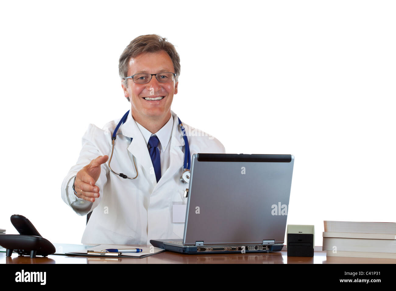 Friendly male doctor sitting in office offering hand for handshake. isolated on white background. Stock Photo