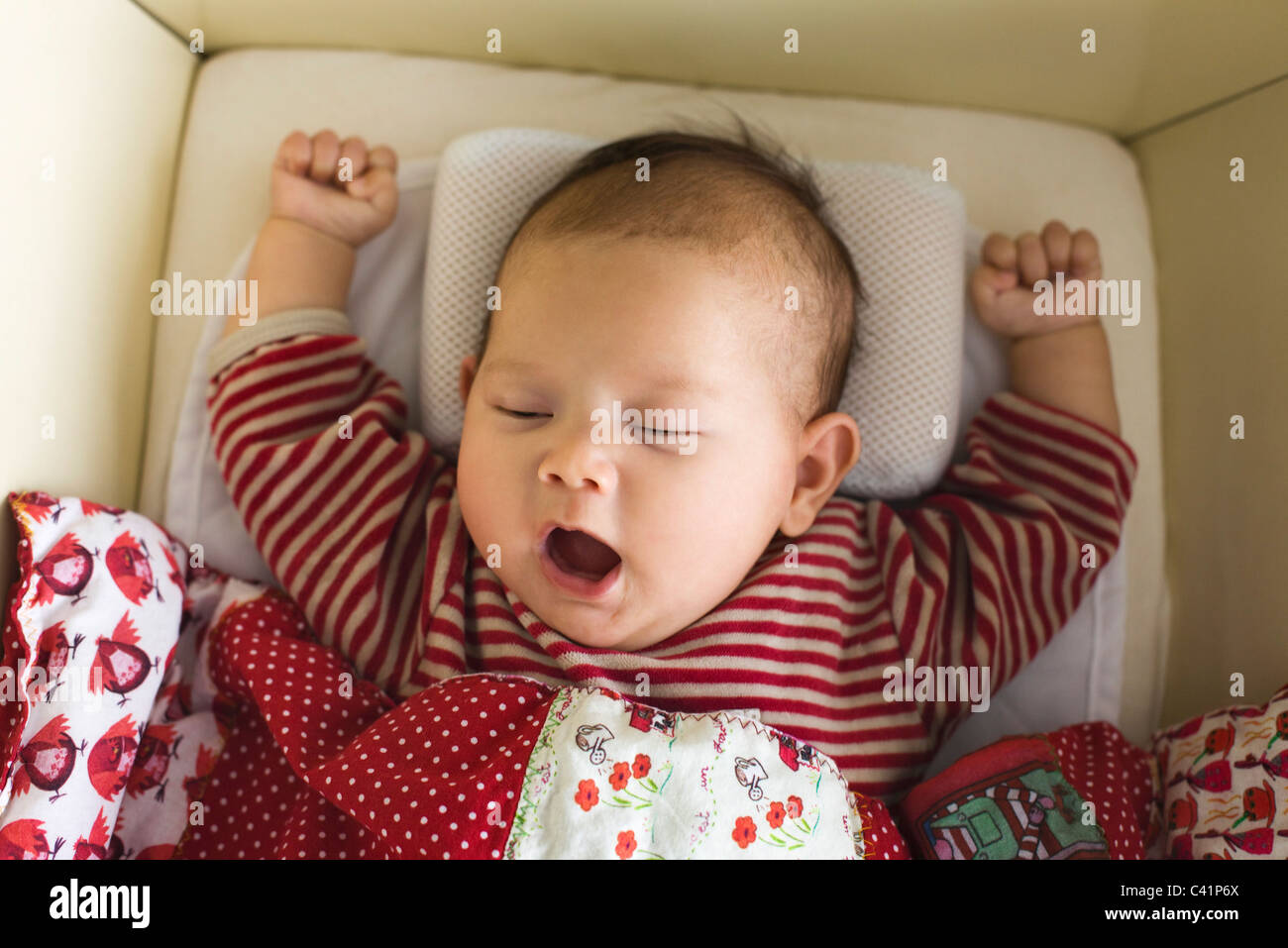 Baby yawning, portrait Stock Photo Alamy