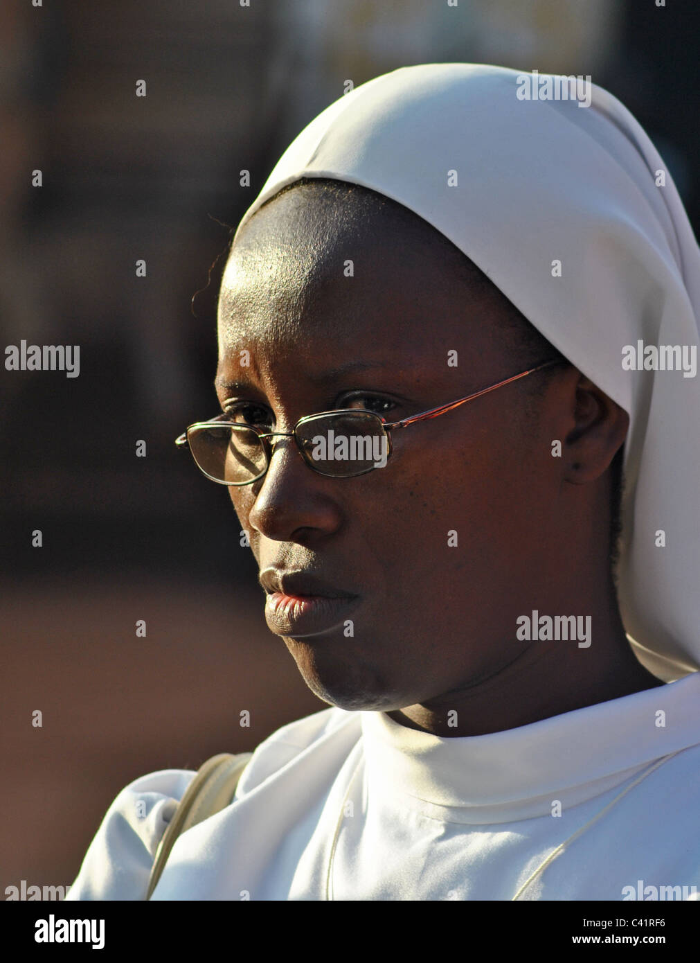 A nun in the town of 'Man', Ivory Coast, West Africa Stock Photo
