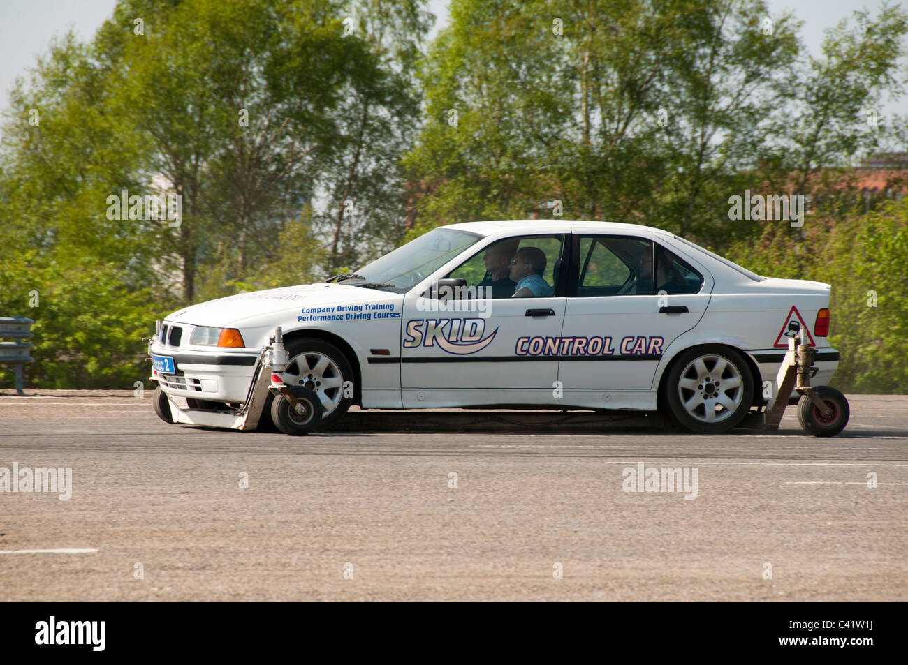 Skid control training car. The outrigger wheels can be raised or or