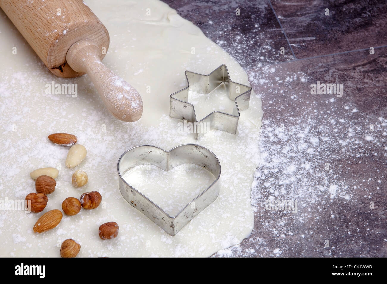 a rolled out dough for biscuits with flour Stock Photo Alamy