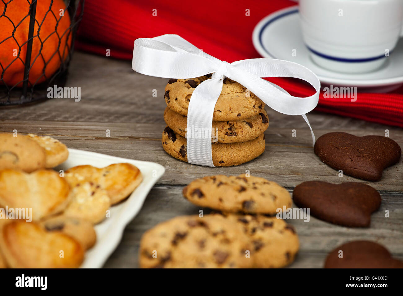Decorated table for a snack with fruit, milk and cookies Stock Photo