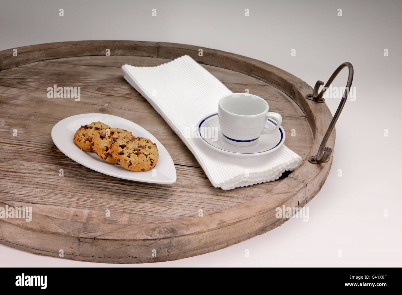 Chocolate chip cookies served on an antique wooden tray Stock Photo