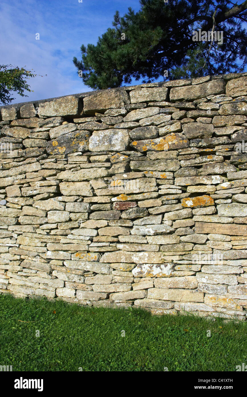 Drywall built with Mendip Somerset stones Somerset England UK. Stock Photo
