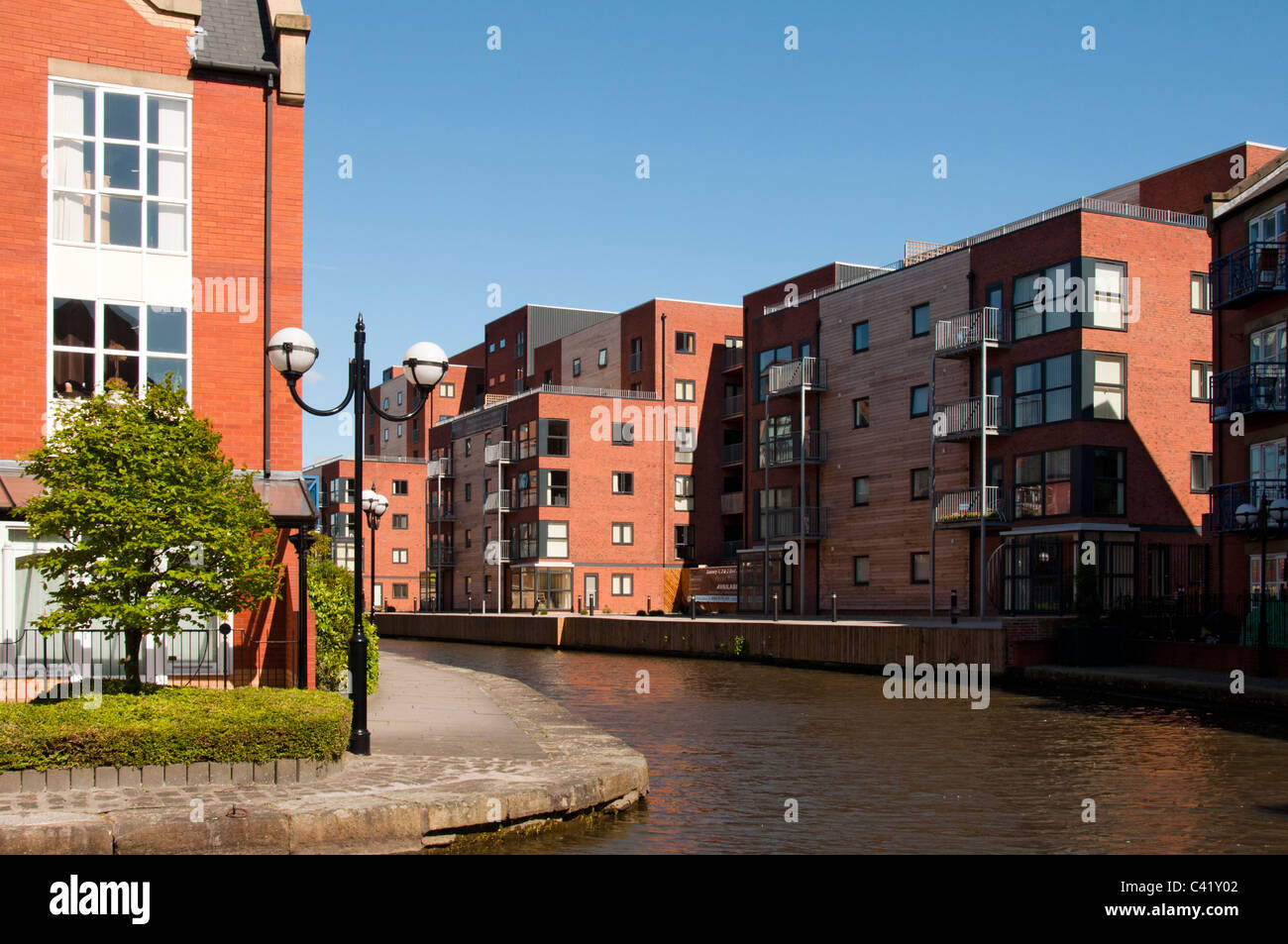 Canal side housing at the Piccadilly Village development, near the city
