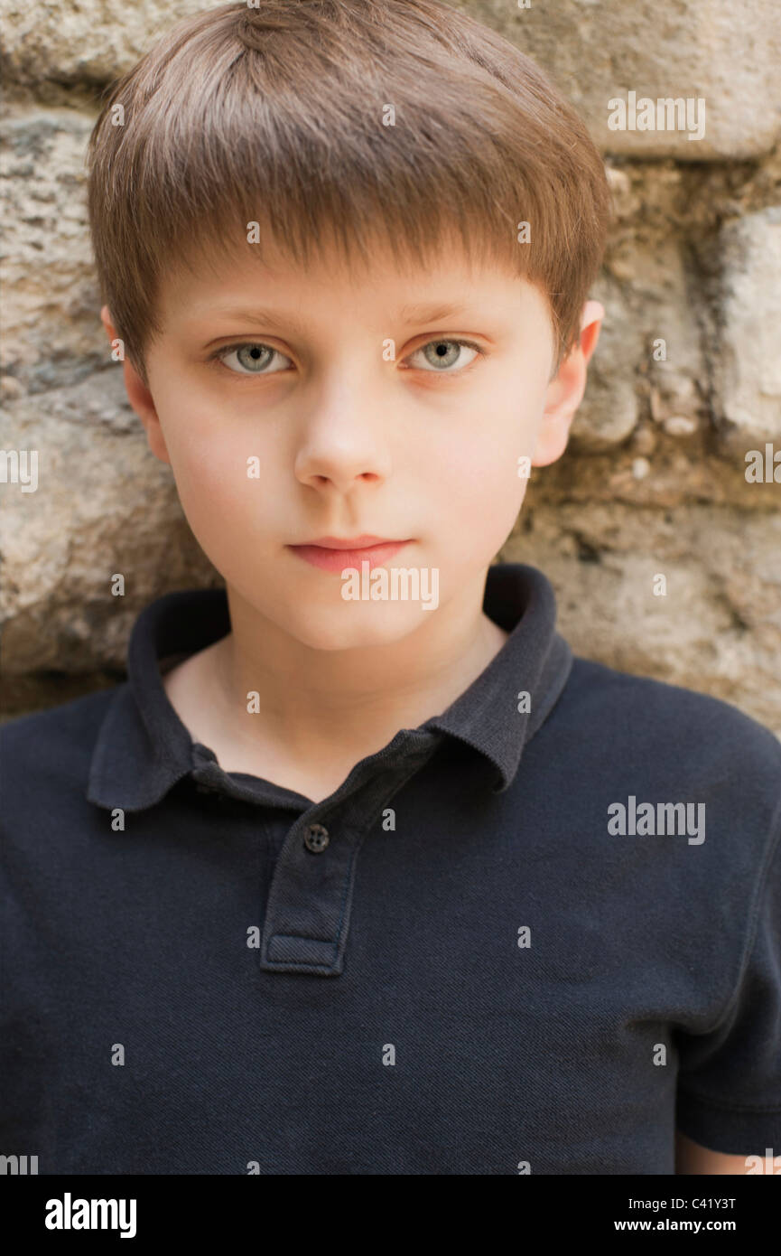 Portrait of a young boy with fair hair and blue eyes Stock Photo - Alamy