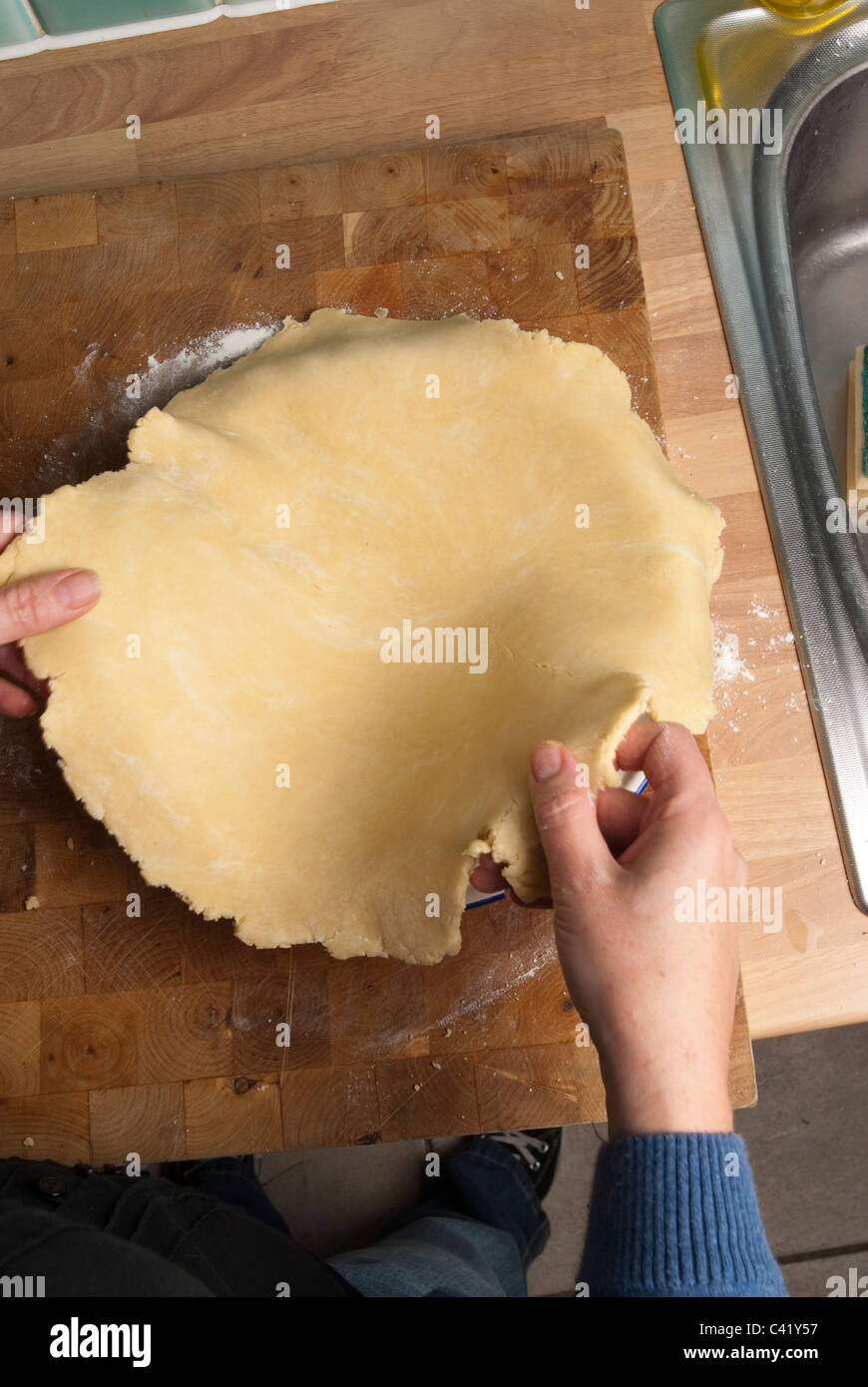 Preparing a pastry case for blind baking UK Stock Photo Alamy