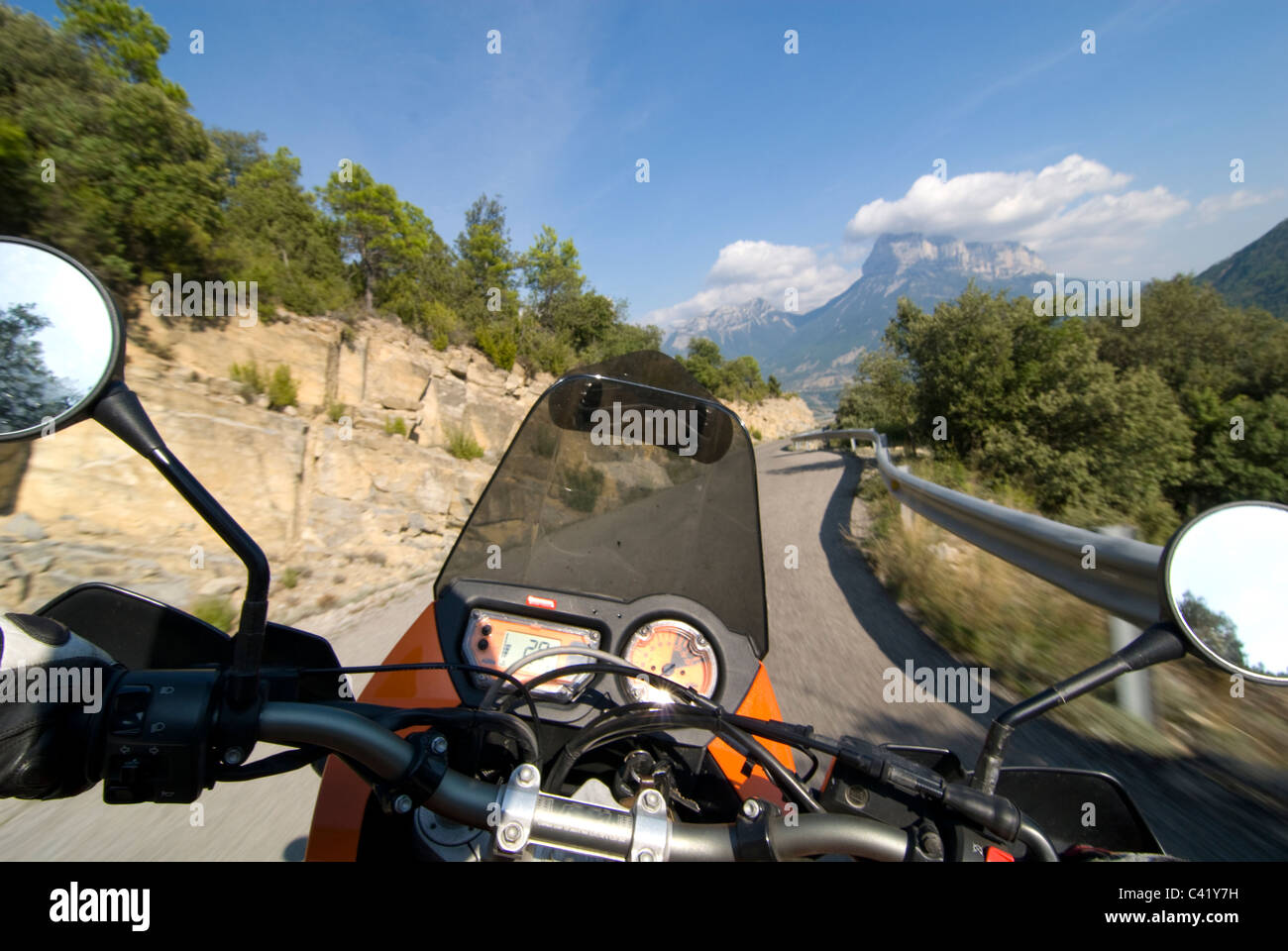 Motorcycle touring in the pyrenees near Yeba, Spain. Rider view Stock