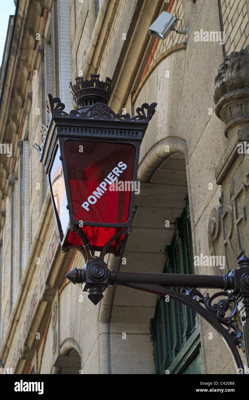 Lamp at a firestation in Paris. Firefighting service in Paris is provided by the Paris Fire Brigade, a unit of the French Army. Stock Photo