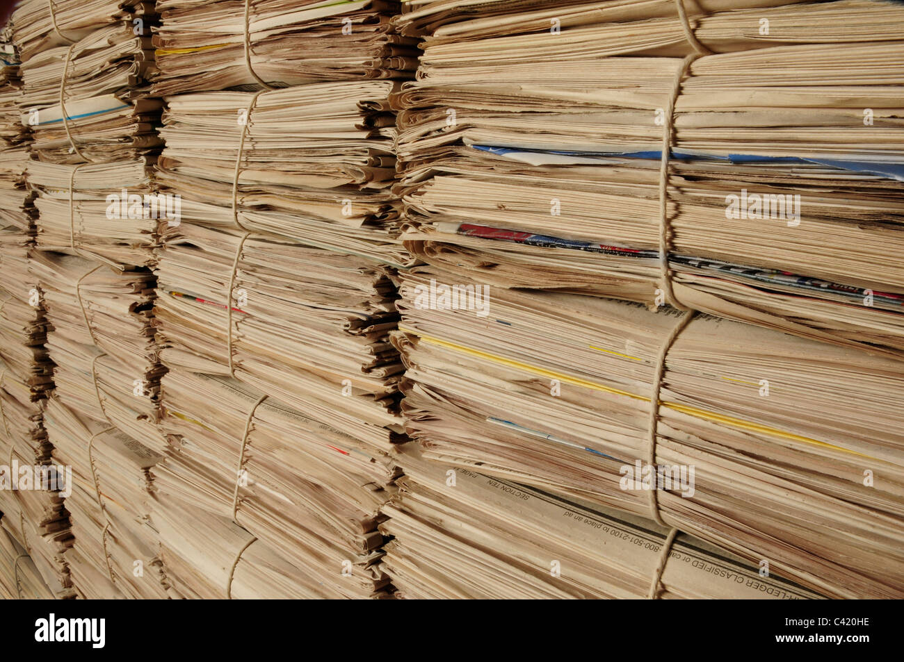 Close-up of piles of newspapers on an angle to be recycled Stock Photo