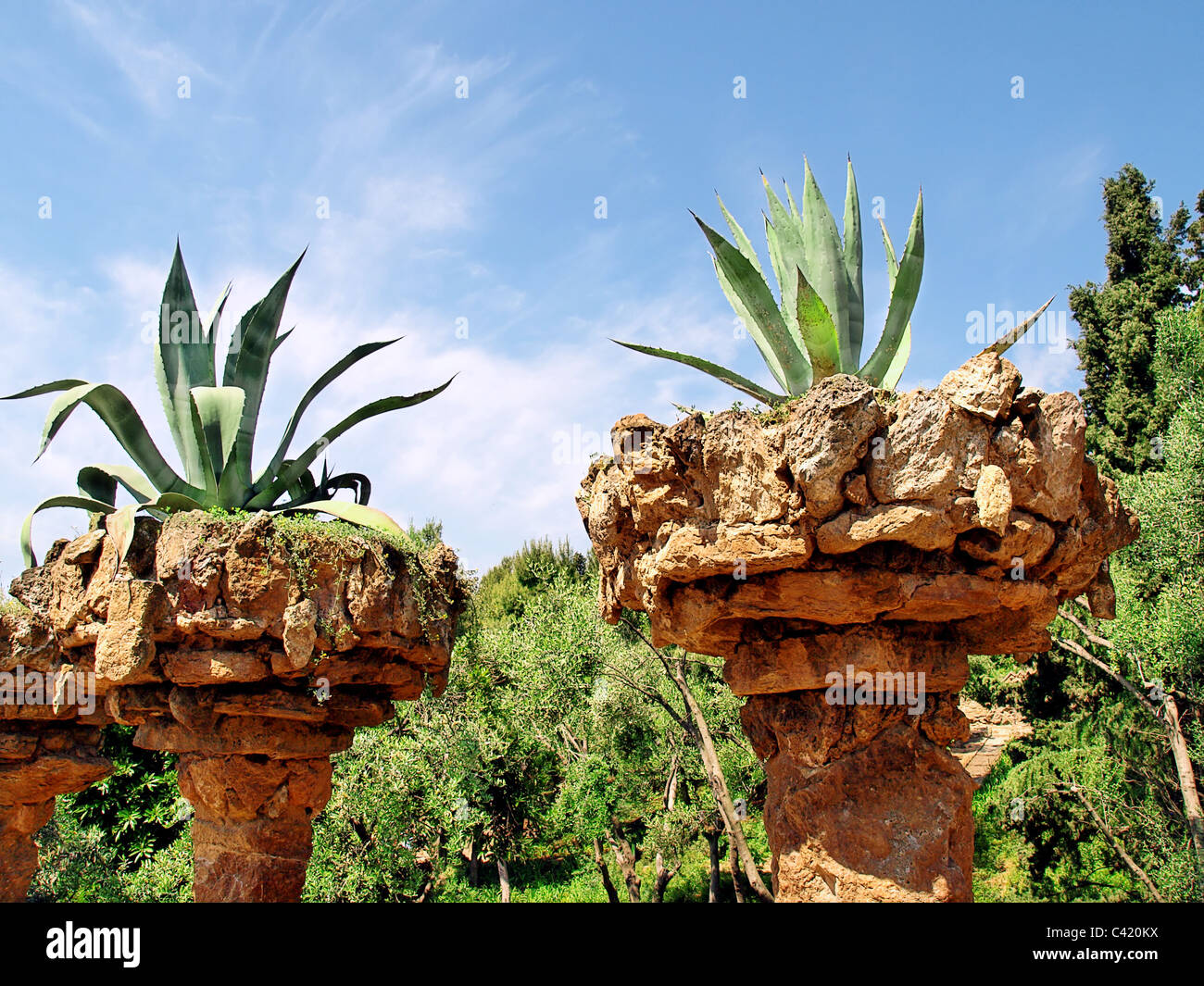 Garden with sculptural stone planter Stock Photo Alamy