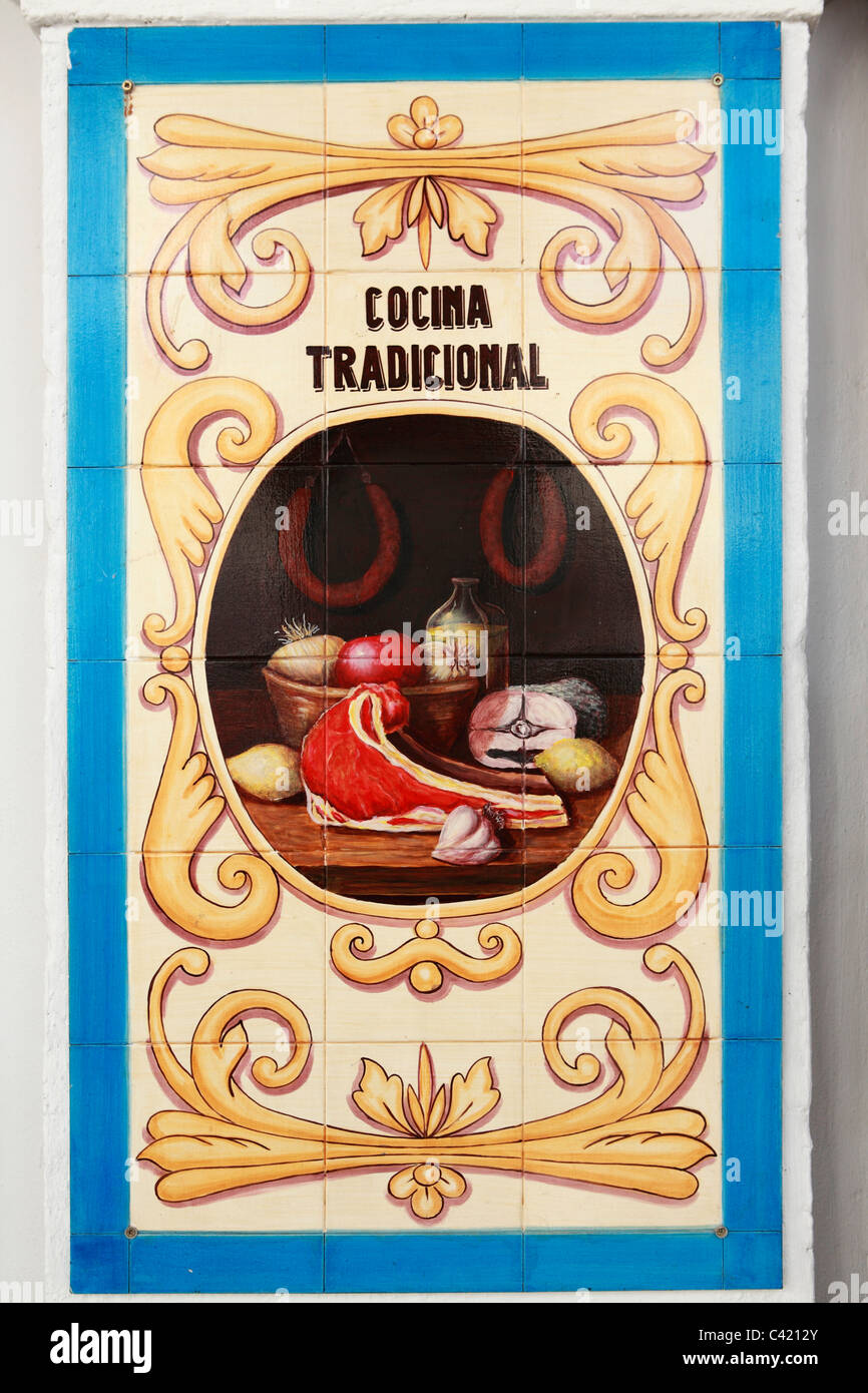 Tiles celebrate the traditional cuisine (Cocina Tradicional) of Spain's Extremadura province. Stock Photo