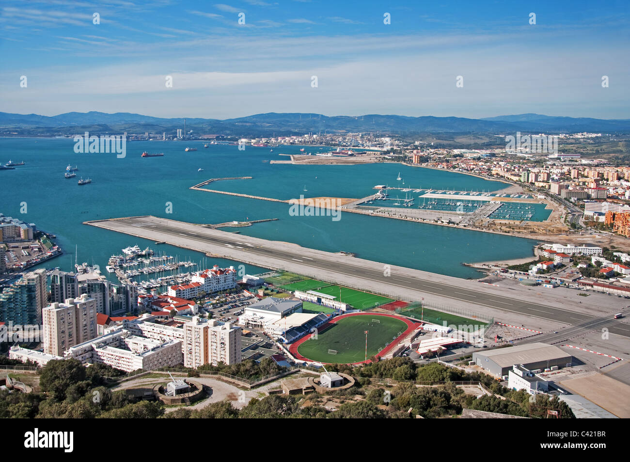 Gibraltar Runway, sports complex and Ocean Village marina Stock Photo